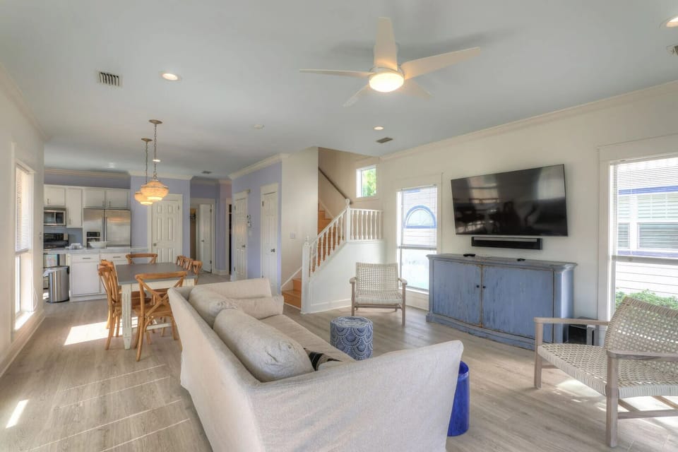 A stylish living room designed for relaxation, featuring cozy seating and a warm, welcoming atmosphere.