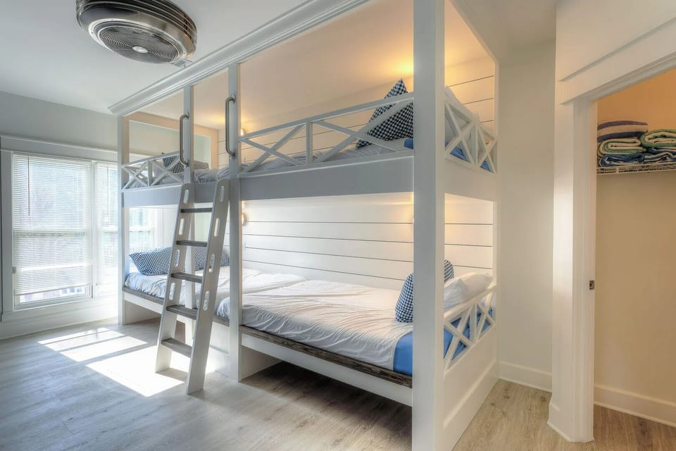 Bedroom 3 features 2 full over full bunk beds.
