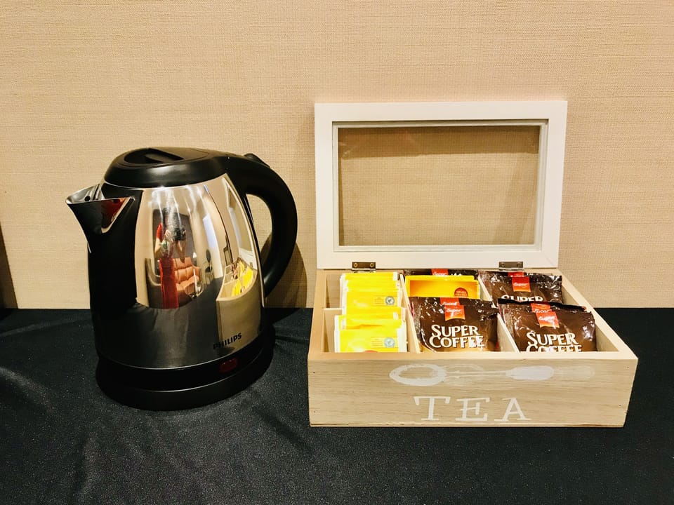 We serve refreshment in lounge.
