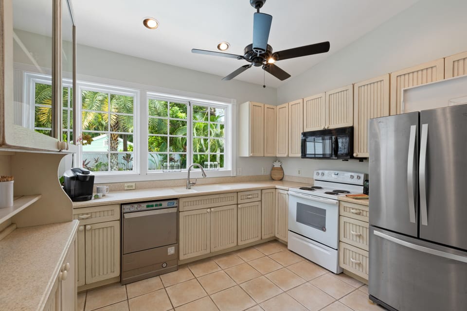 Kitchen on main level of the inn with pool view
