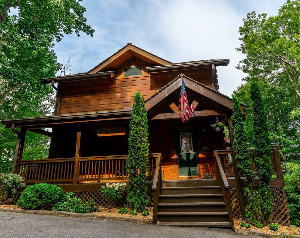 Traditional cabin look with level, paved entry right to your front door.