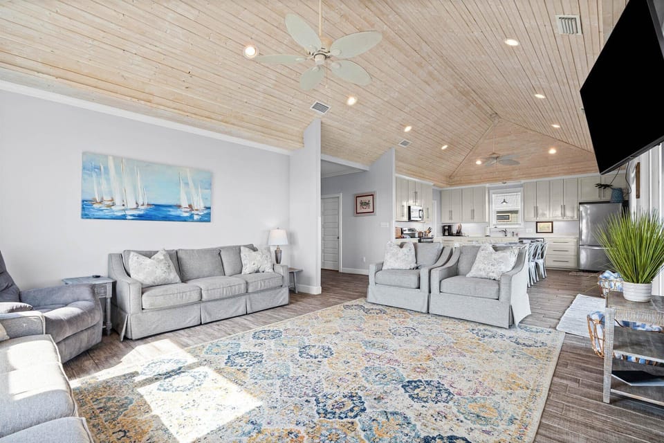 The Blue Crab Common Area with Living Area, Dining Table and Kitchen