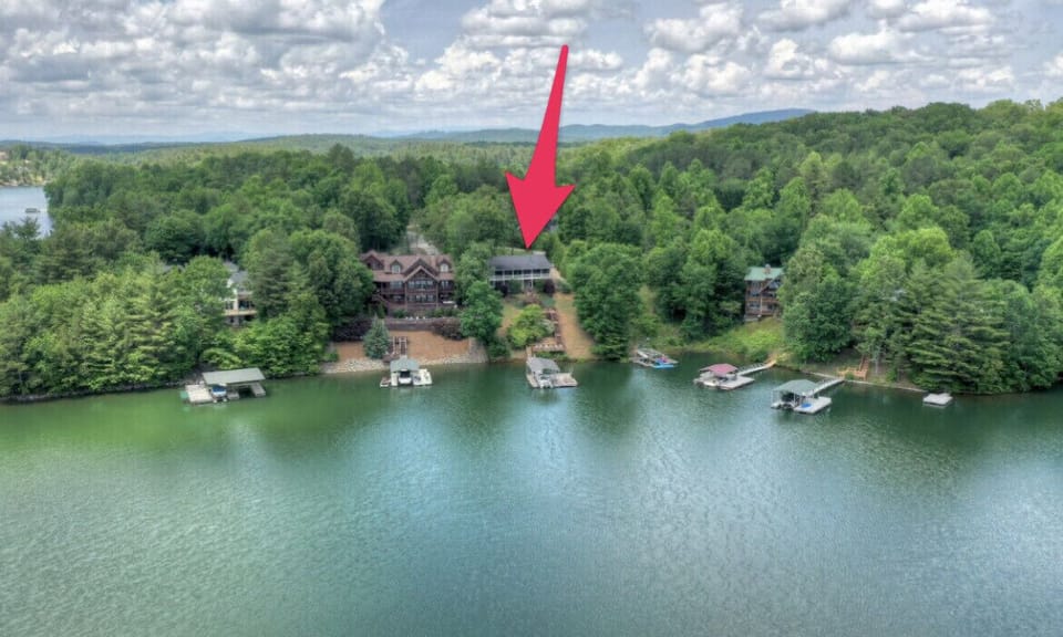 Aerial view of  cottage location noted by red arrow 