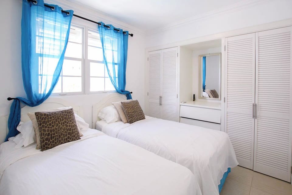 The third bedroom with two single beds