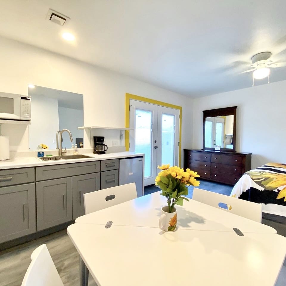 Full kitchenette w/ all utensils and cook ware. 
