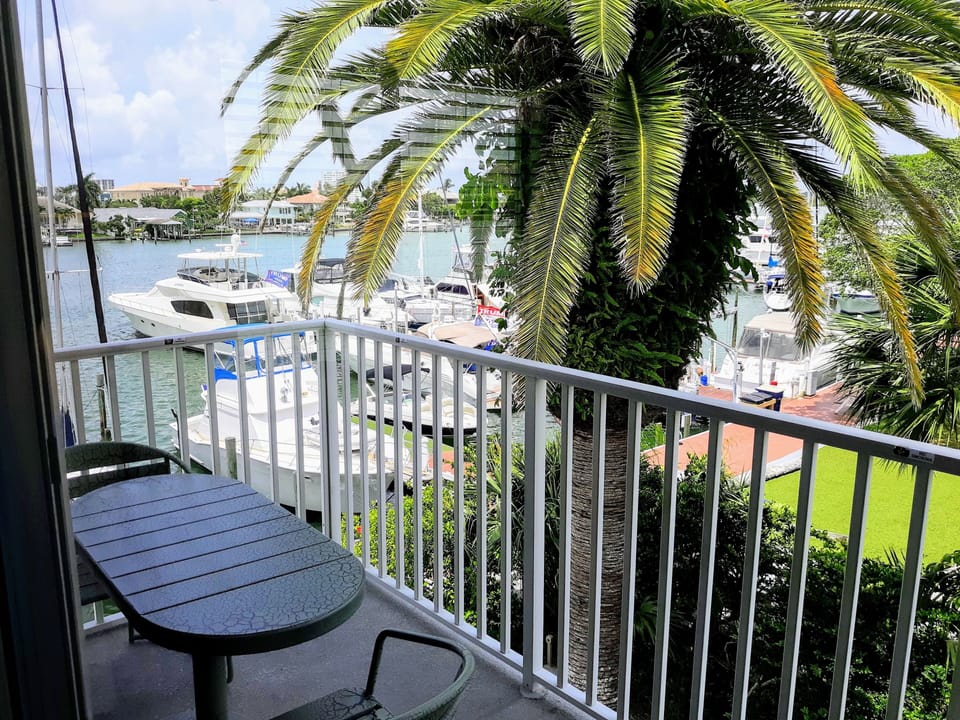 The corner balcony is an extension of your living room & kitchen area.