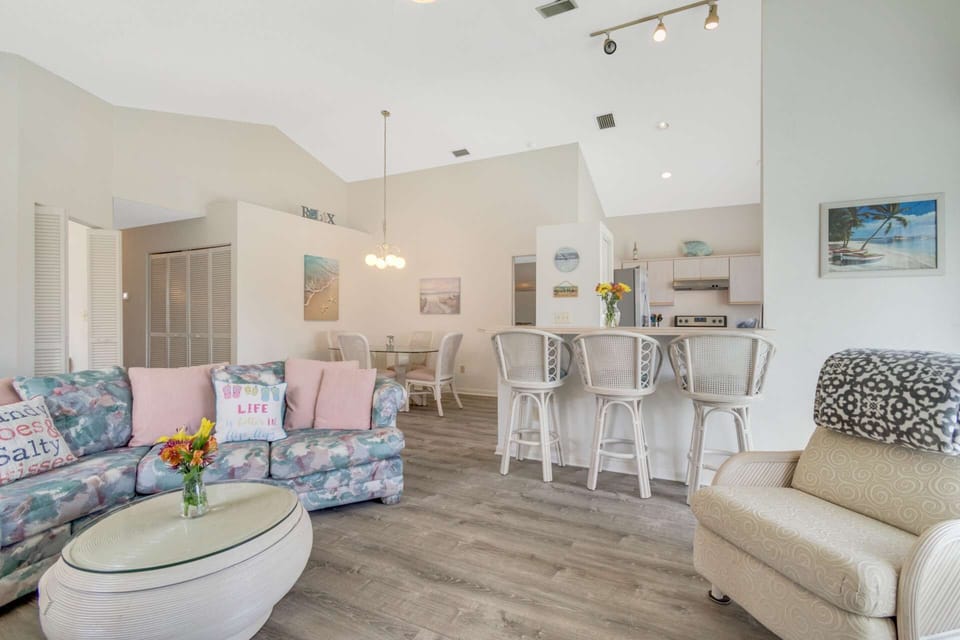 Enjoy the perfect blend of comfort and entertainment in this stunning Open Concept Living Space with views of the water.