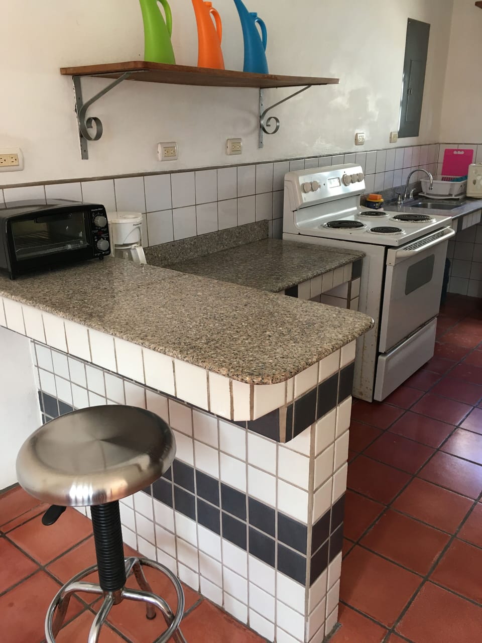 Breakfast bar with granite countertop
