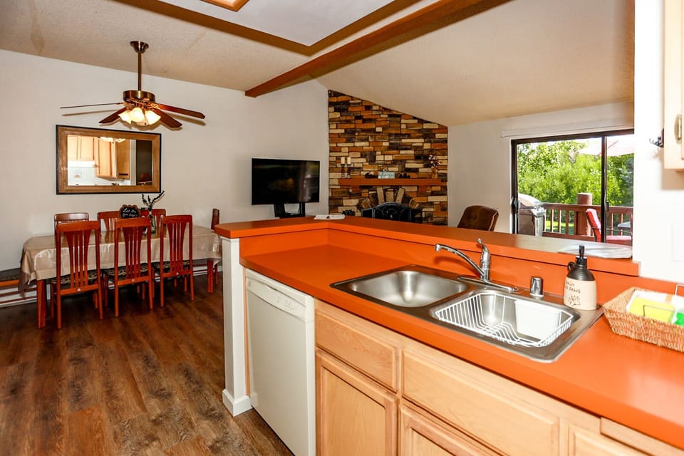 Stylish kitchen space with spacious counters, blending functionality and design for memorable stays