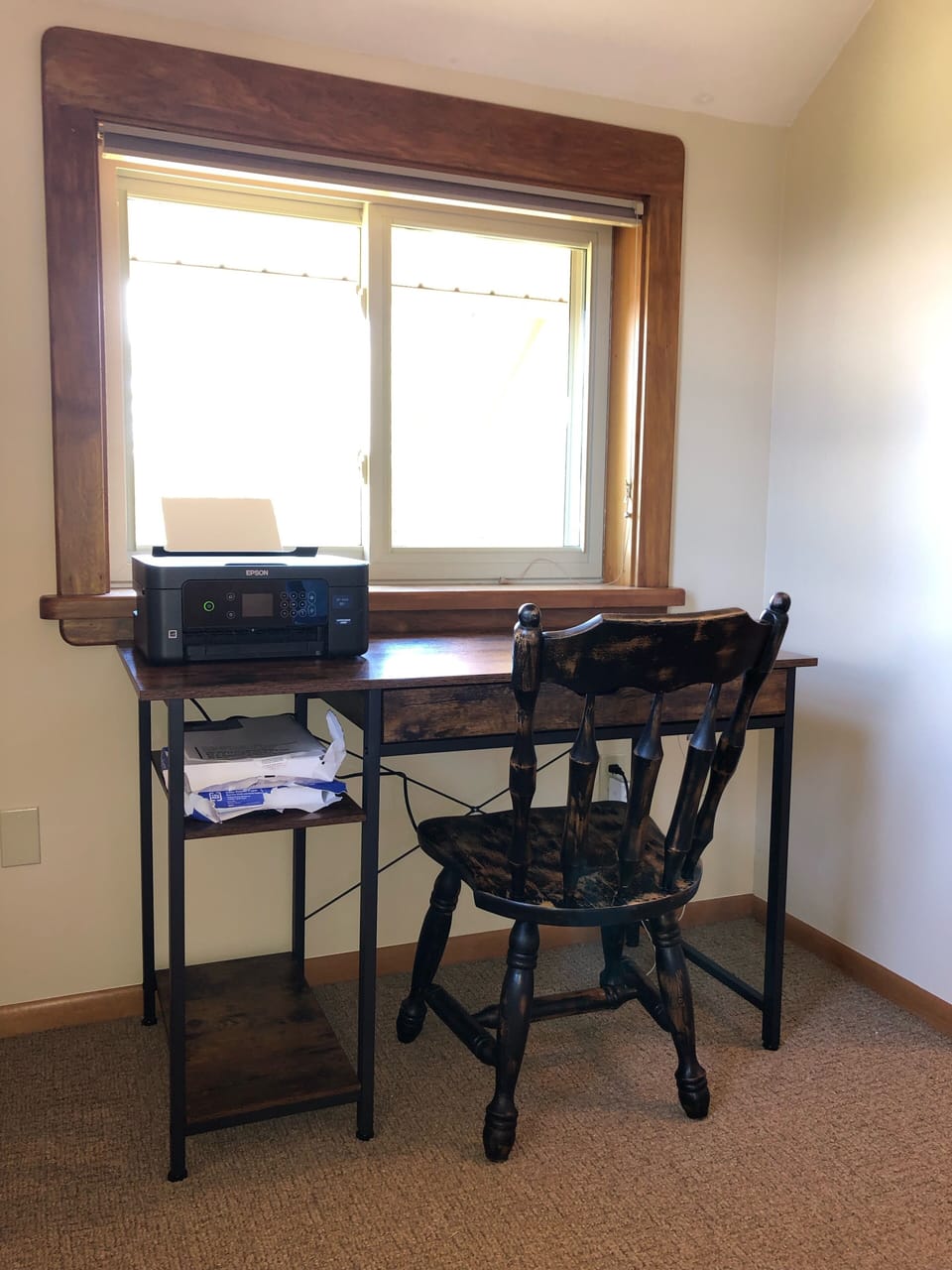 Desk with printer located in master bedroom.