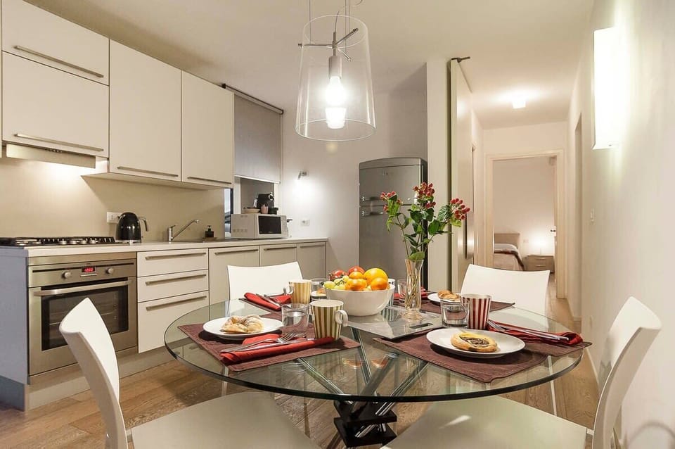 Modern Kitchen with All Appliances and Dining