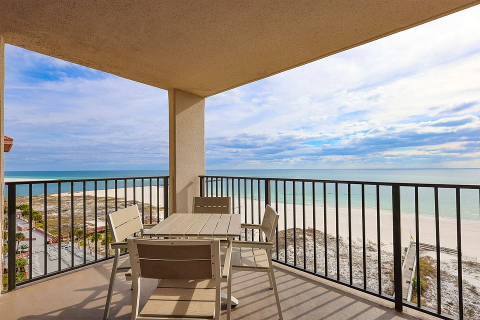 Relax on the balcony while taking in the expansive views of the tranquil waters and shoreline