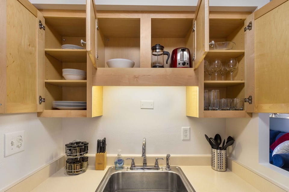 Our kitchen has everything you need for feasting on carry out or cooking a gourmet meal.