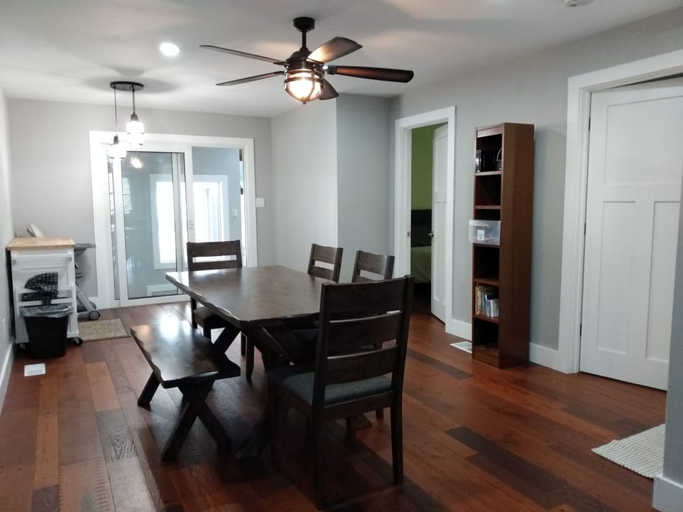Dining room with highchair and games and books for family fun