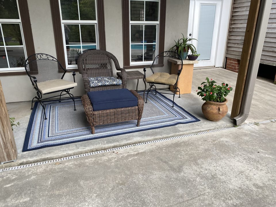 private patio overlooking the pool and bayou