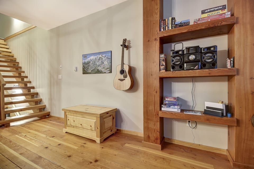 Guitar, stereo w/ Bluetooth connection, can set to play to speakers at hot tub 