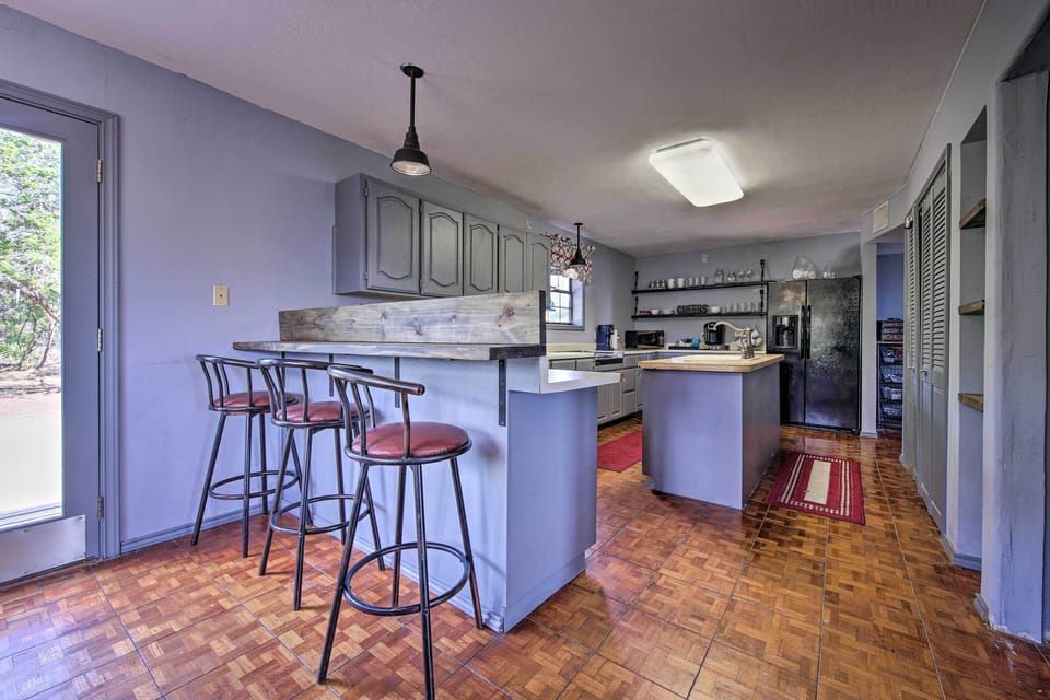 The eat-in kitchen is fully equipped with all the bells and whistles.