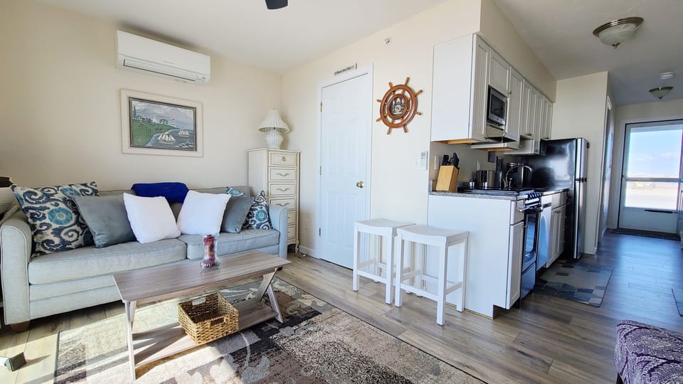 Comfortable living room and galley kitchen