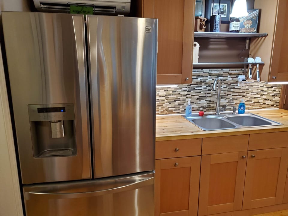 Large refrigerator to store all of your food and drinks