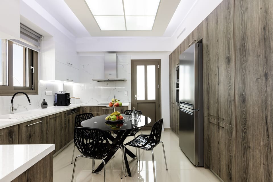 Featuring a breakfast table & coffee machine. 