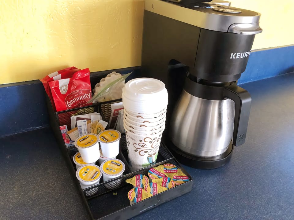 Whether it's coffee, tea, hot cocoa, your own Kcup selection our coffee bar setup offers a Keurig Duo Plus to brew a variety of single cup brews or a carafe for the family.