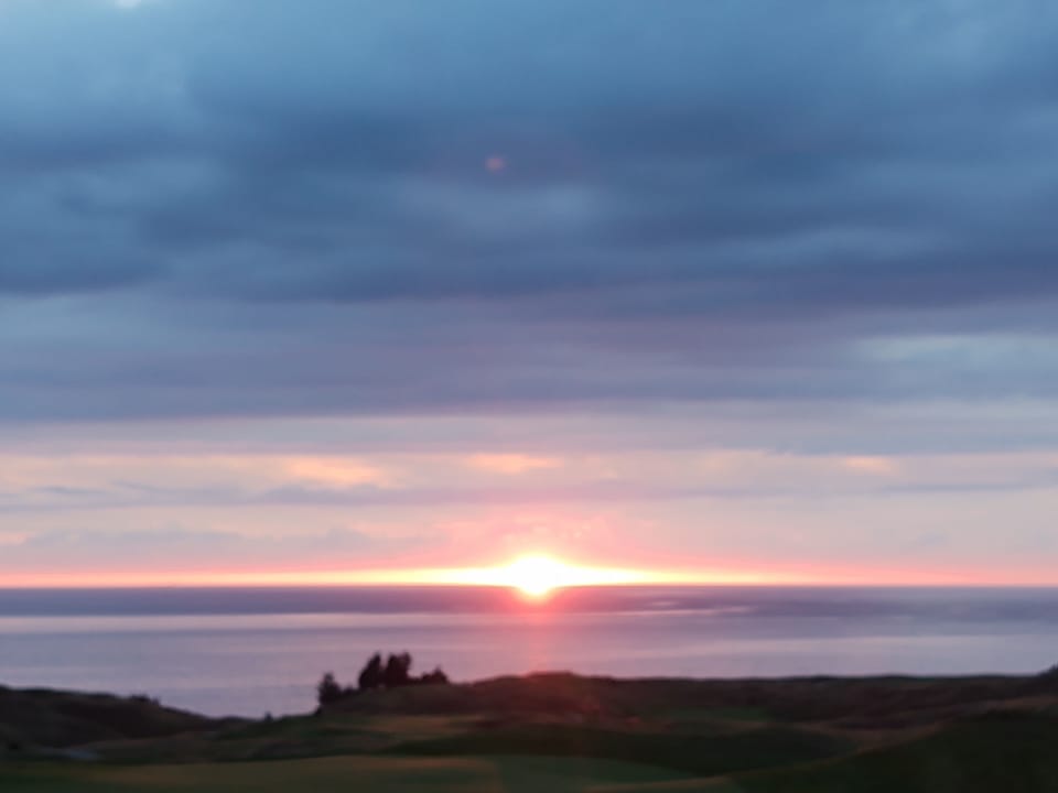 Arcadia Bluffs Golf Course sunset view; wonderful dining options