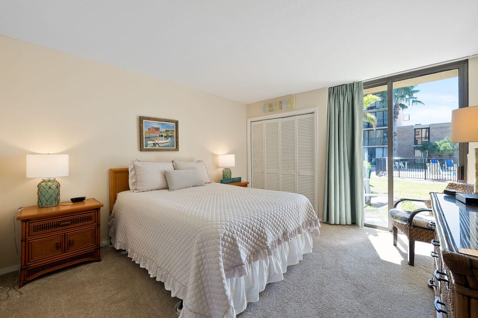 Enjoy a relaxing space with easy access to the patio and pool area.