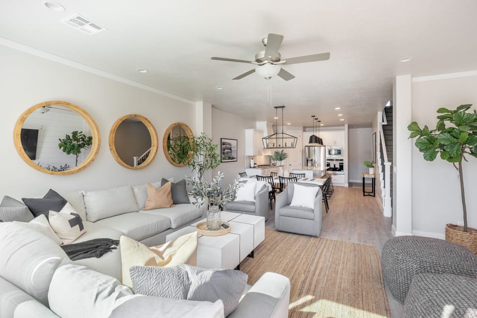 Living Room View - The living room is designed as an open floor plan and is a great gathering place for meals, games, or watching TV during your stay.
