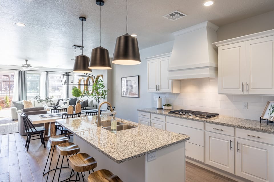 Kitchen Island - The Kitchen Island comfortably seats 4 adults and creates a great space for serving and preparing meals.