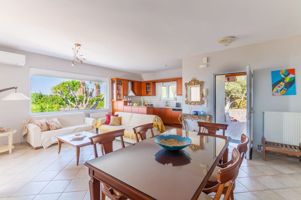 Fully equipped kitchen and two confortable sofas