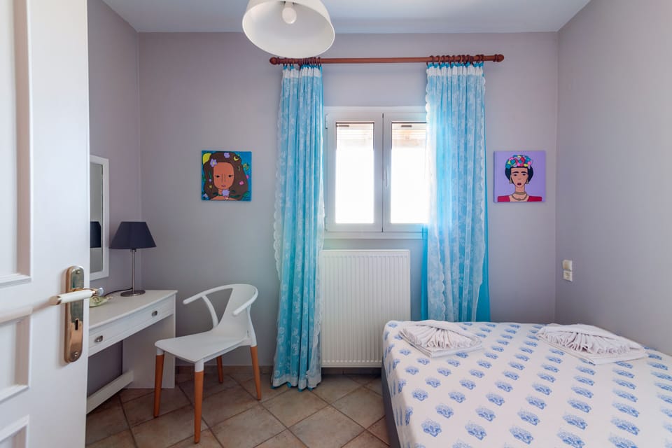 Bedroom with two people bed perfect for your kids