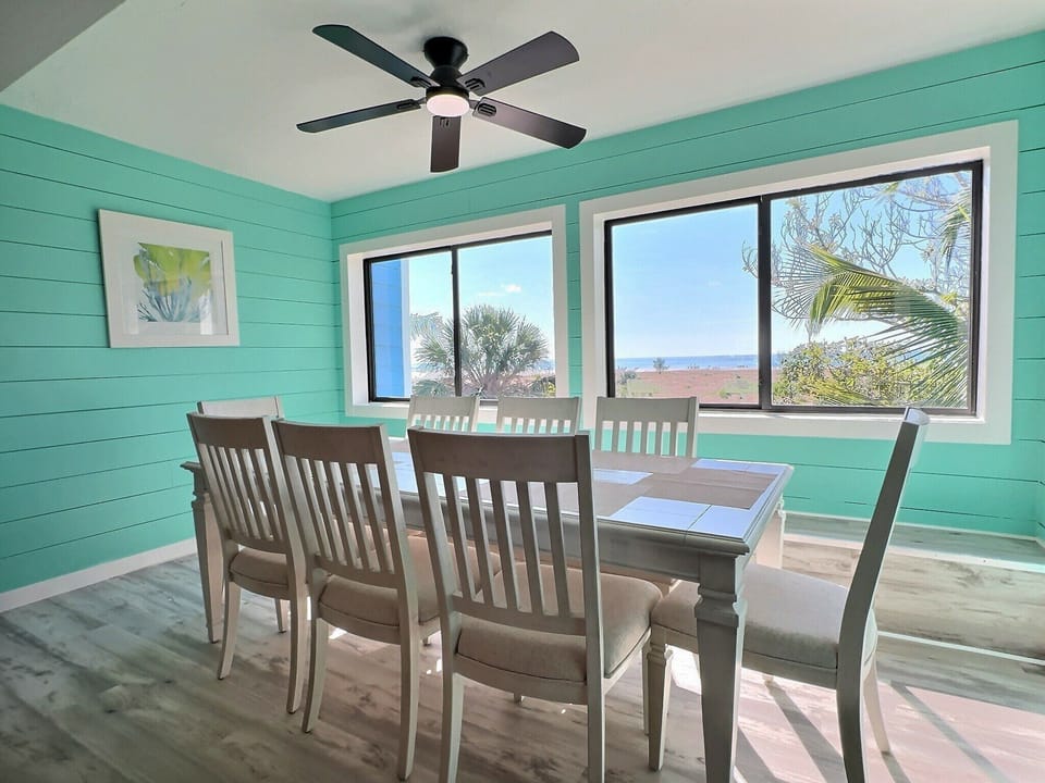 dining area with seating for 8 overlooking the beach