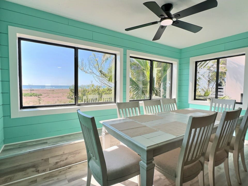 Dining area with large 8 person table.