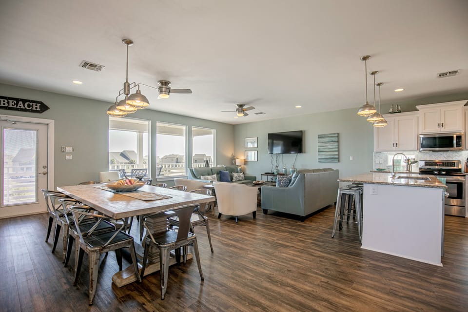 Open Living/Dining/Kitchen with beach/ocean views.