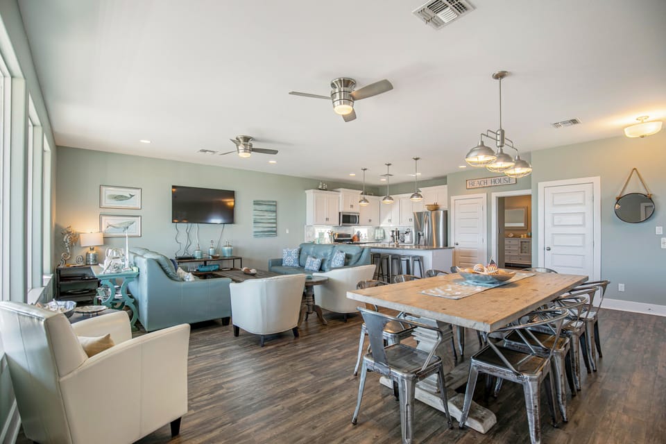 Open Living/Dining/Kitchen with beach/ocean views.