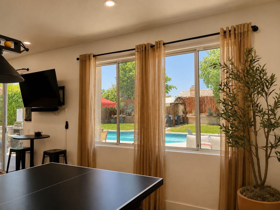 Gorgeous backyard views through the large windows. 