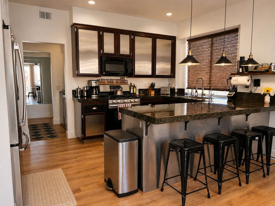 Fully equipped kitchen with modern appliances and ample counter space, perfect for whipping up vacation meals.