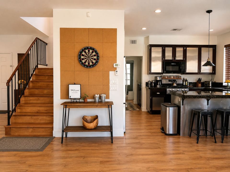 Add some friendly competition to your stay with the indoor arcade-style dartboard setup.