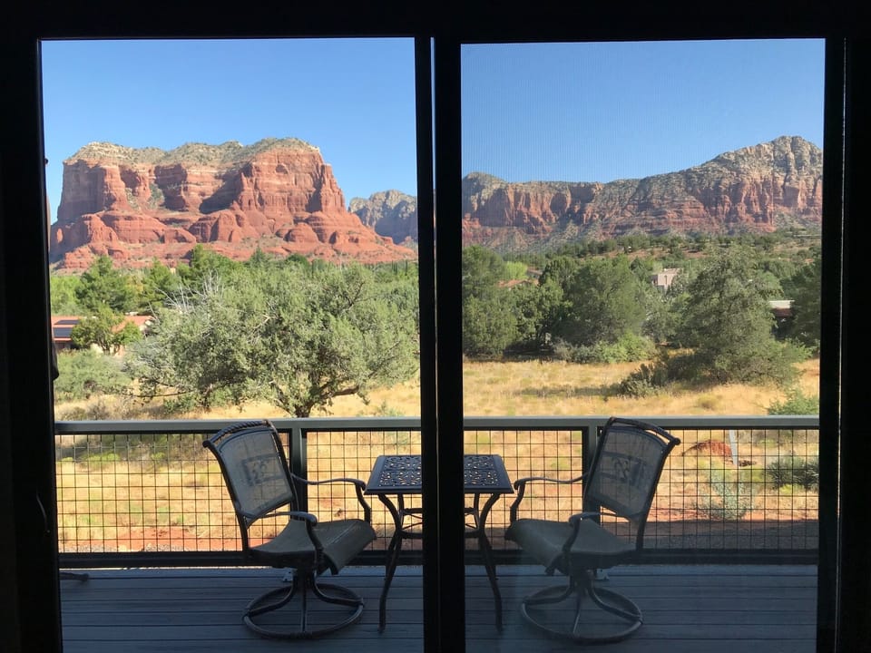 Balcony with bistro set and grill
