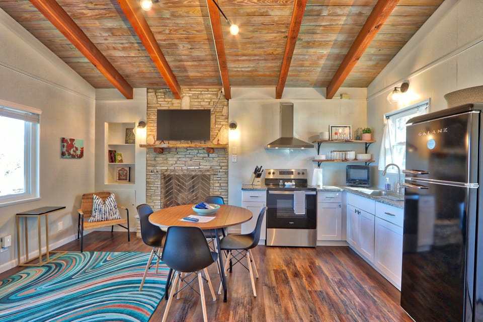 View of dining area and kitchen.