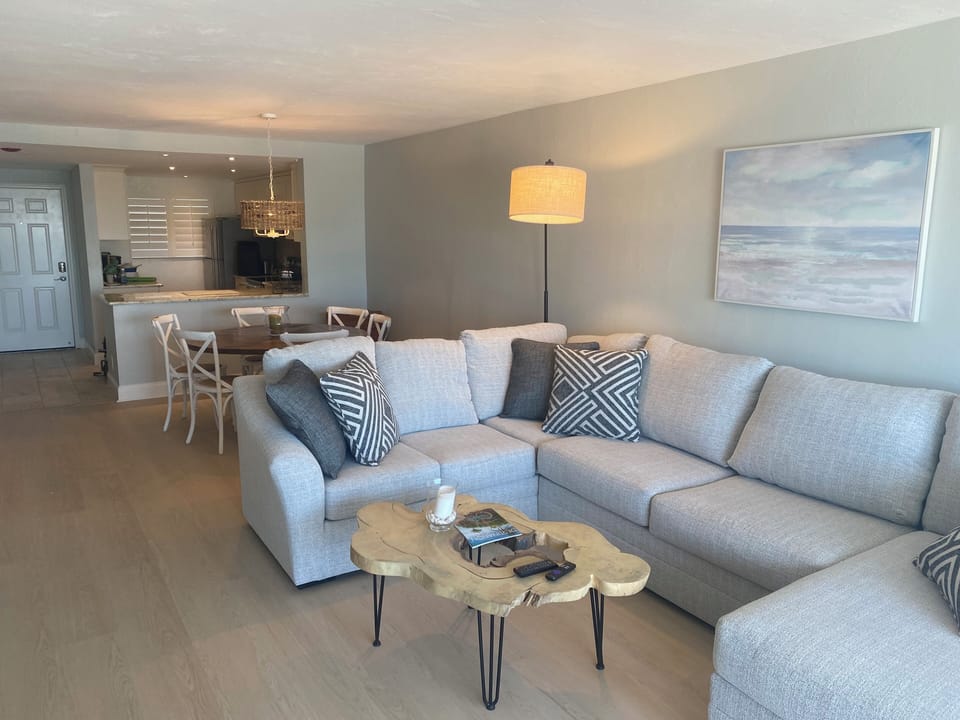 Family room. Sectional couch with chaise lounge and 50 inch tv
