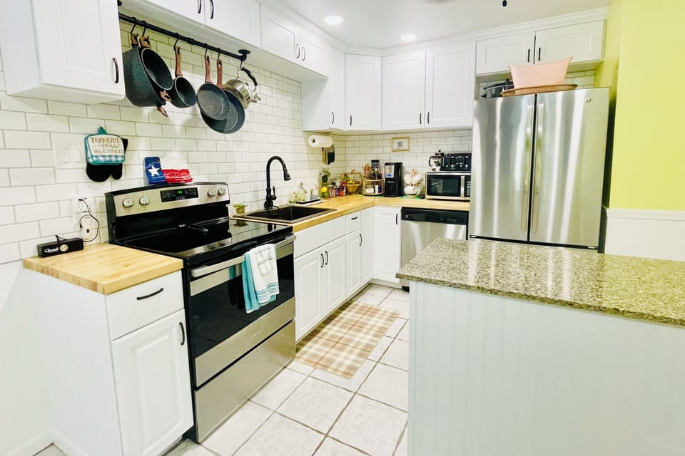 Complete with baking supplies, serving dishes, crockpot, ice cream maker, & more