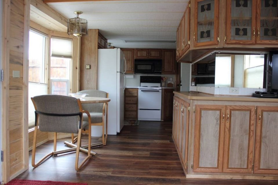 Dining for two. Folding chairs and TV trays available for more. 