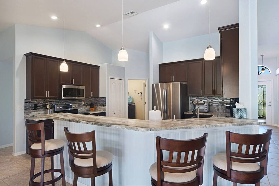 Enjoy your morning coffee or watch your family make meals at the breakfast bar