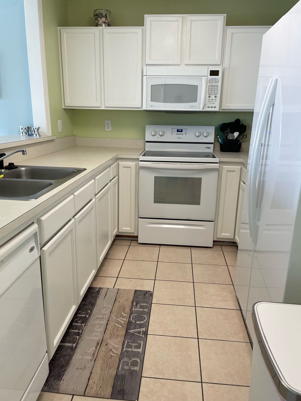 Fully stocked kitchen with pots, pans, utensils and everything else you need