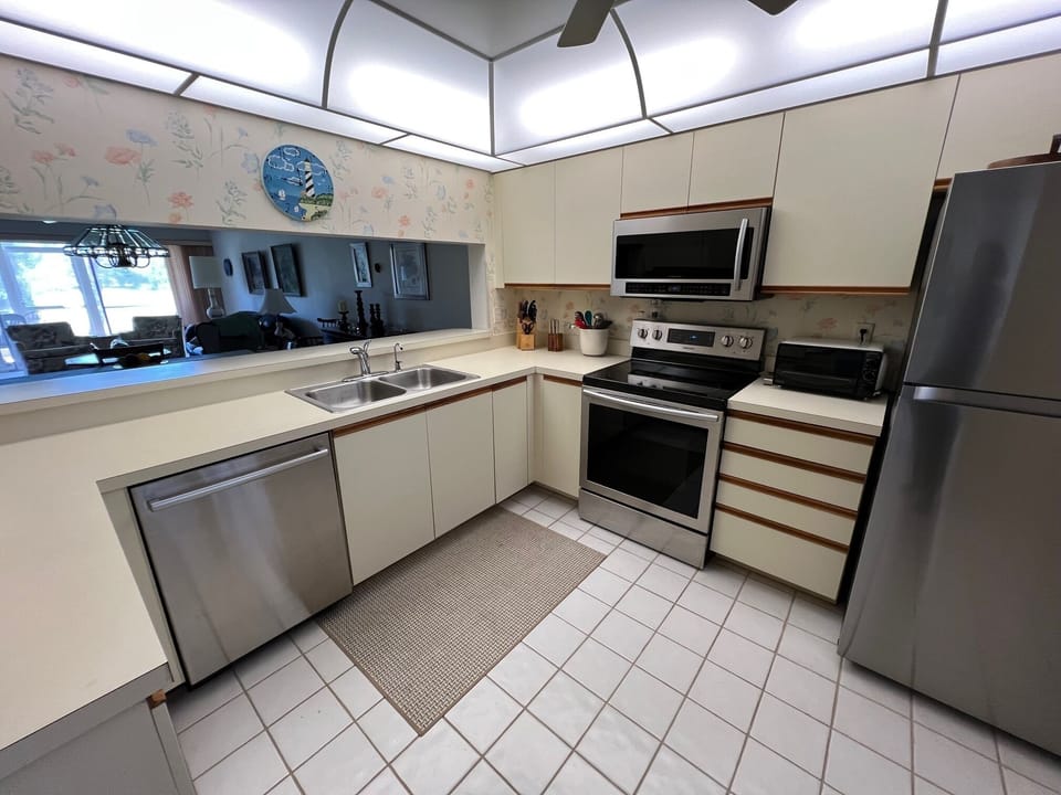 Generous and Convenient Pantry to the right of the Refrigerator.  
