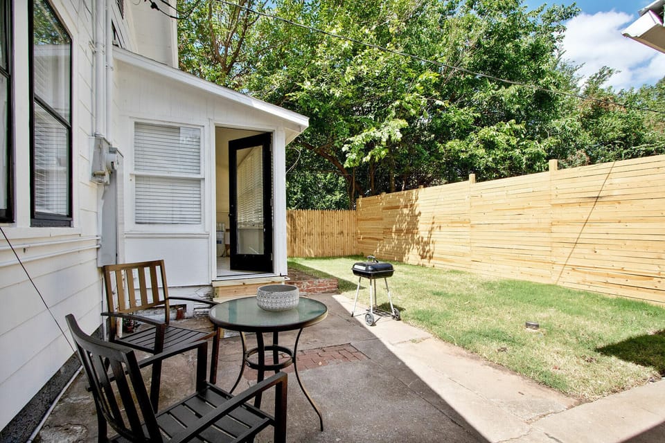 Backyard patio, fully enclosed back yard, with grill