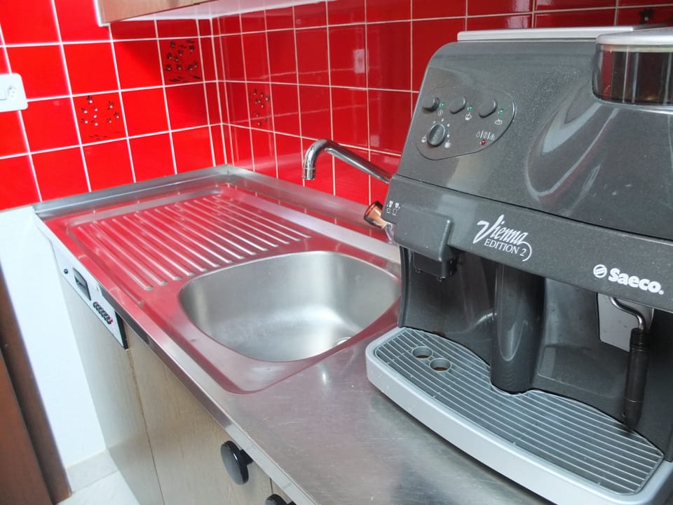 Fully Equipped Kitchen with Coffee Machine