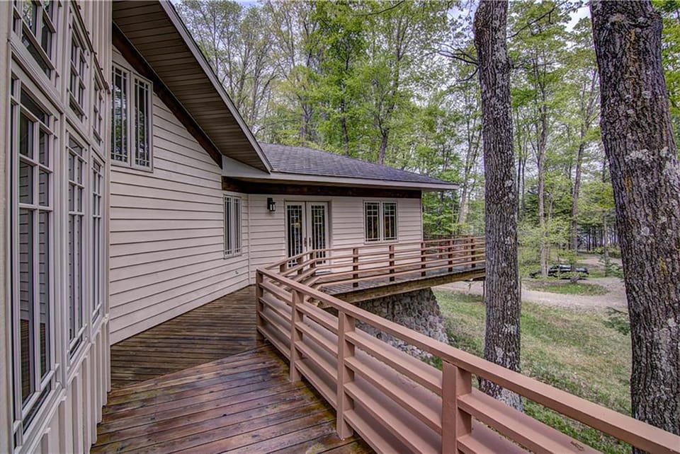 Deck runs around the house and back to the master bedroom