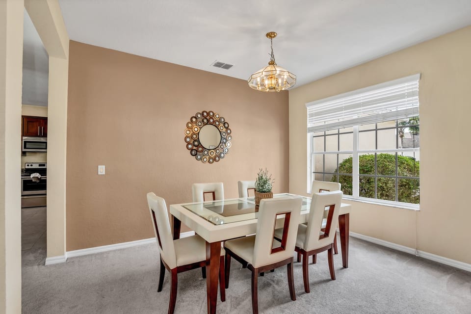 Bright family dining table with views of the outdoors.